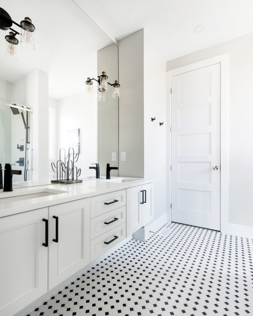 white and black tiled bathroom